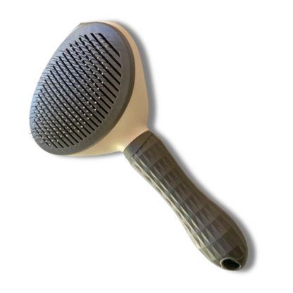 Cepillo removedor de pelo con botón