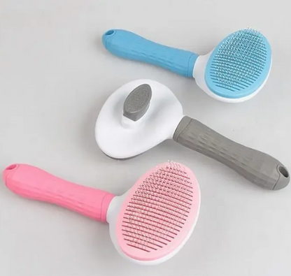 Cepillo removedor de pelo con botón